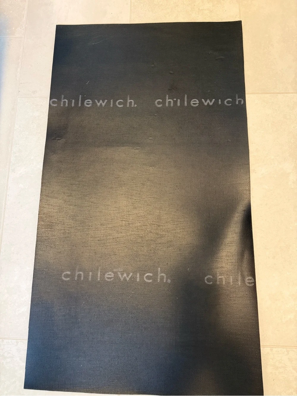 Gray Striped Non-Slip indoor or outdoor rug.